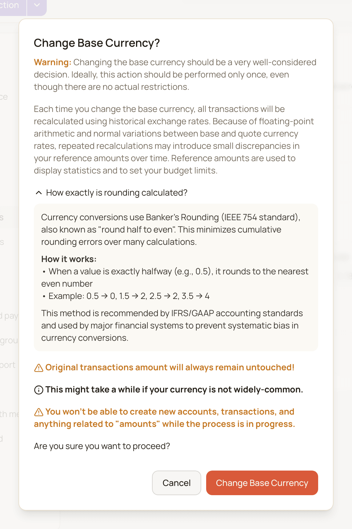 The Change Base Currency? confirmation dialog with its warnings and the rounding explanation expanded.