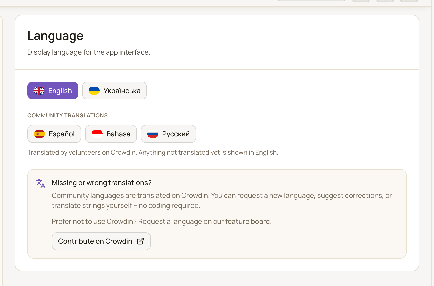 The Language settings page with the English and Ukrainian buttons, the Community translations group and the Contribute on Crowdin box.