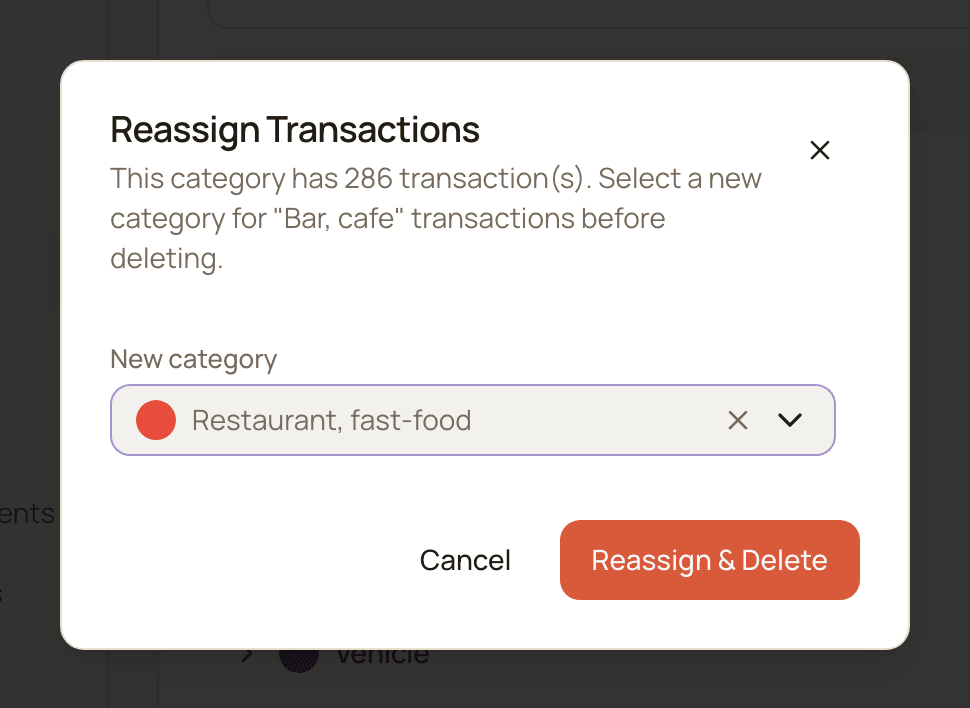 The Reassign Transactions window asking for a new category before deleting a category that has transactions.